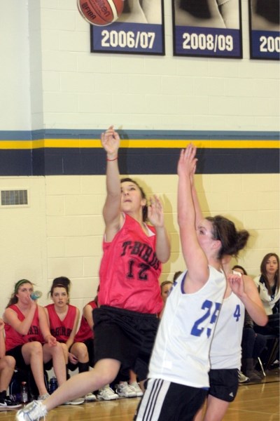T-Bird Abby Fairholm goes to the basket during action at the Pembina Hills Junior High Divisional Tournament held Friday and Saturday in Barrhead. The girls brought home gold 