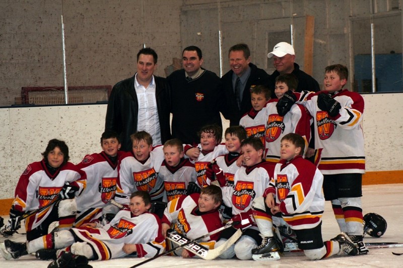 The Westlock Atom Selects celebrated their 1660 Tier 2 Atom Hockey League title Saturday at home following a 13-6 win over the Morinville Mustangs.