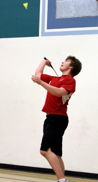 R.F. Staples&#8217; Brendan Jensen kept his eye on the birdie at the badminton zone tournament held last Tuesday in Barrhead.