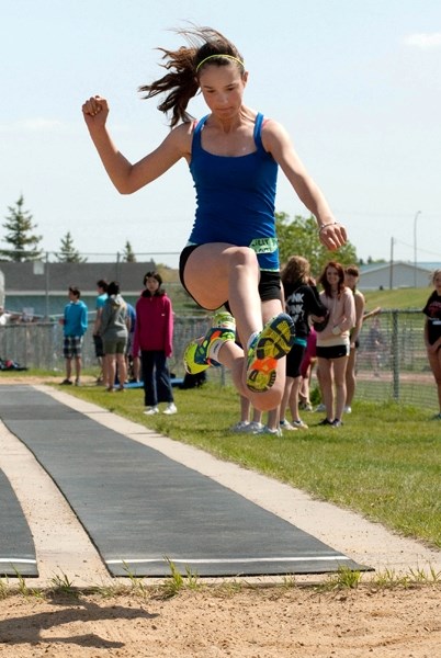 St. Mary&#8217;s Lilly Artemenko flies through the air in the intermediate girls&#8217; long jump event at divisionals in Barrhead. She won the event to book a spot at the