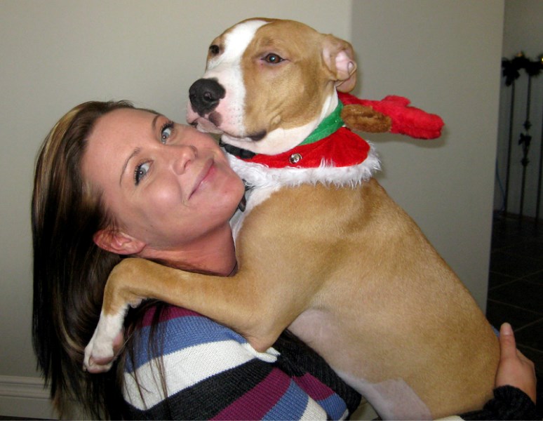 Chelsey Mykyte with her dog Wonda. Wonda disappeared from Mykyte&#8217;s family&#8217;s acreage in southeast Westlock County on June 20, and was found dead a few kilometres