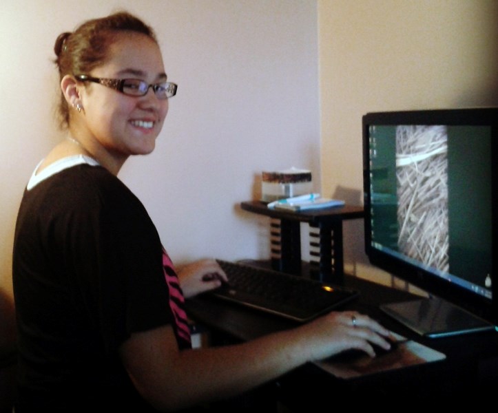 Natasha Carruthers, 14, works on some of her Grade 9 courses online from her home in Westlock. Improved technologies has made it easier for students to get their education at 
