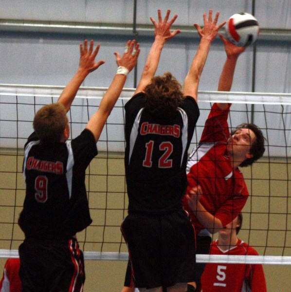Chase Rau attacks during the Thunderbirds’ semifinal win over the Hilltop Chargers during their home tournament at the Westlock Rotary Spirit Centre on Saturday.