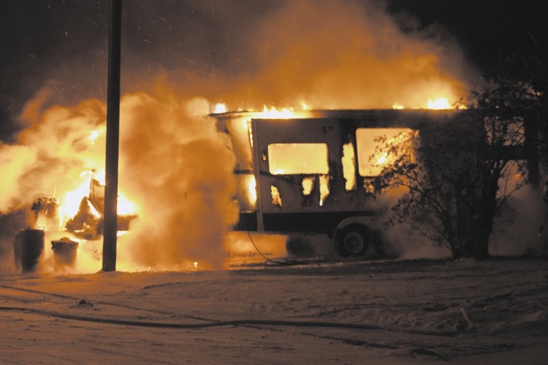 An early morning fire in Eastglen last Thursday completely destroyed this RV and damaged the house adjacent to it. Westlock fire fighters were on scene quickly and got the
