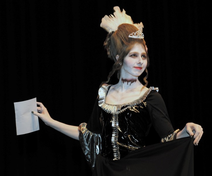 Showing off the work of stylist Amber Cena, model and R.F. Staples student Ashley Chayka dances around the Cultural Arts Theatre stage as a ghostly Marie Antoinette. Cena’s