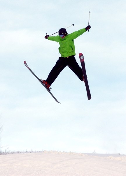 Dustin Jamieson flies into the air off of one of the jumps at the Tawatinaw Valley Alpine Nordic Centre on Saturday, Dec. 15. The grand opening of the ski hall was marked by