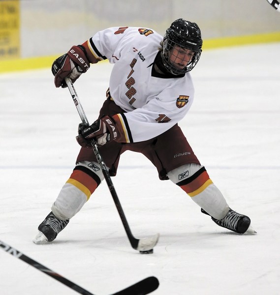 Tristan Tremblay slices his way through the Millet defence Jan. 18 at the Spirit Centre. This year the Westlock &#038; District Minor Hockey Association has 130 skaters.