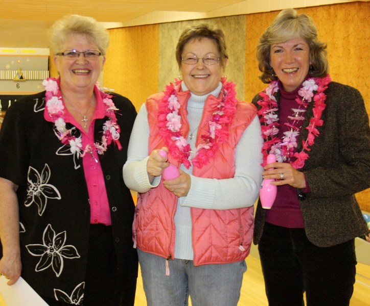Westlock Bowl’s Carolyn Kohlsmith (left), Westlock town Coun. Sheila Foley and Barrhead-Morinville-Westlock MLA Maureen Kubinec are all smiles after the alley’s Knockdown