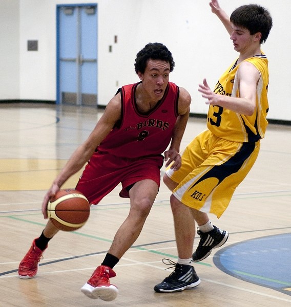 Westlock’s Dustin Gatzki keeps the ball moving down court at the BCHS basketball tournament last weekend. The T-Birds beat Barrhead 73-67 in the Saturday-night final.