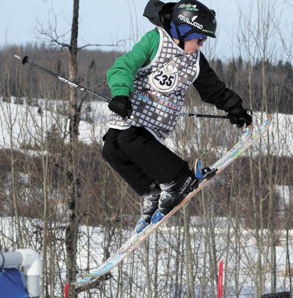Carter Norman caught air during the mogul event Saturday, March 2, at the Tawatinaw Valley Freeriders Club Competition held in Tawatinaw.