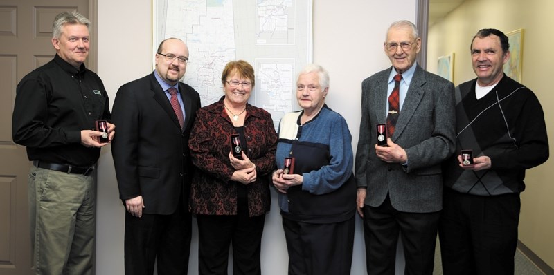 Westlock-St. Paul MP Brian Storseth (second from left) presented five locals with Queen Elizabeth II Diamond Jubilee Medals last week. Receiving medals were (L-R) Wayne