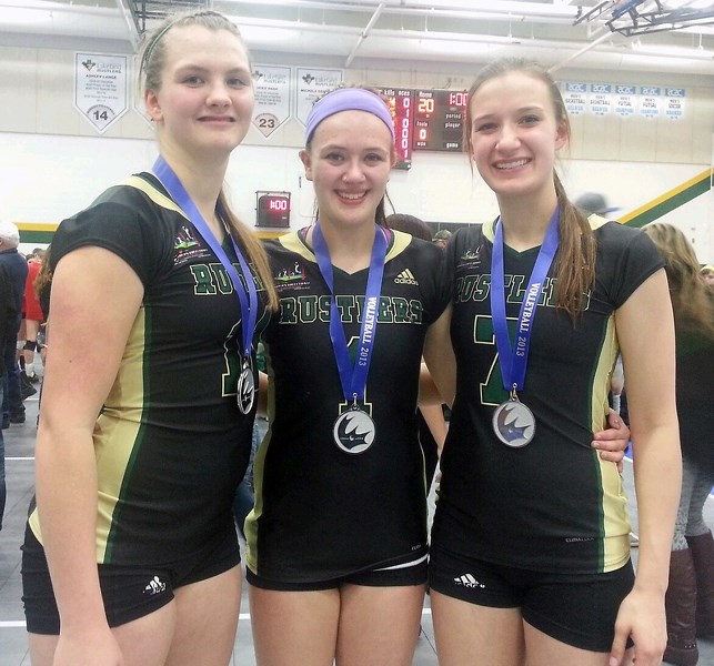 L-R: Jessica Carlyon, Sophie Desranleau and Tina Frose sported silver medals around their necks after placing second in the CCAA Women’s National Volleyball tournament at