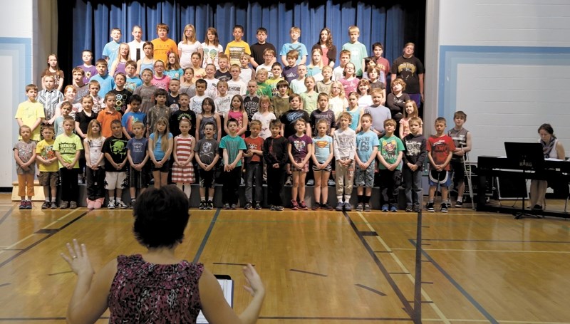Dapp School students, under the direction of Sandi Johnston and accompanied by Lisa Seatter, perform the song ISS-Is Somebody Singing for Music Monday on May 6.