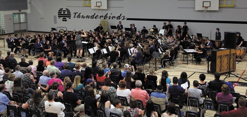 R.F. Staples music director Anne-Marie Switzer conducts the Pembina Hills Powerband during the Music Monday concert on May 6. Close to 100 students from RFS and Barrhead
