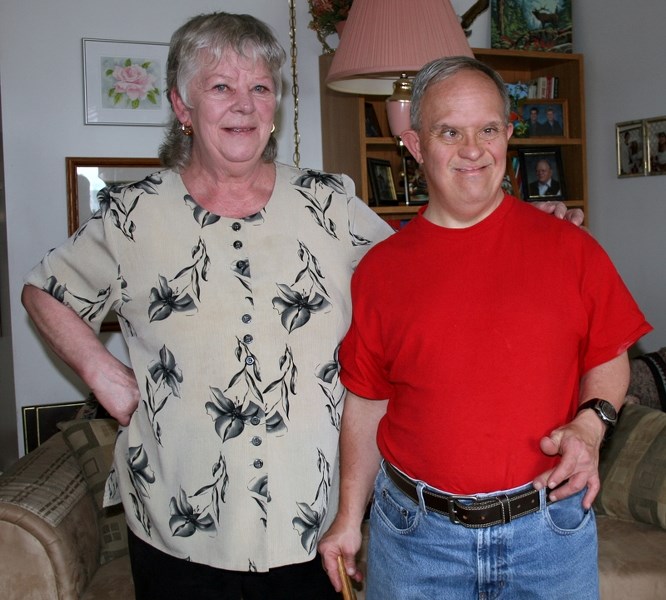 Shirly Coles and Robert Shank during an afternoon at Brookside Village. Shank and his family are facing a huge cut to the amount of funding he receives via the Persons with