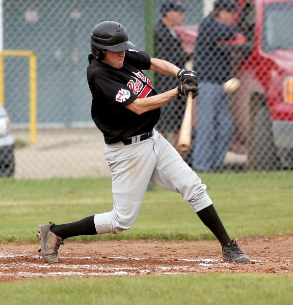Westlock Grey Lion Ryan Rau makes solid contact against the Edmonton Warriors on May 31.