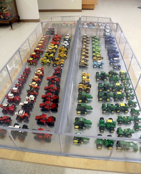 A small selection of Henry Senko’s model tractor and farm implement collection on display at the Canadian Tractor Museum.