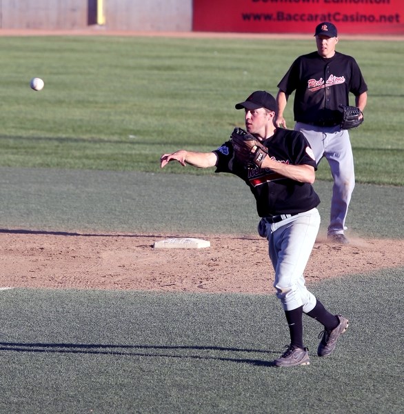 Grey Lions’ second baseman Ryan Rau fires a clean throw to first for an out in the fifth inning of the team’s 11-2 win over the Woodslee, Ont. Orioles on Aug. 3 at Telus