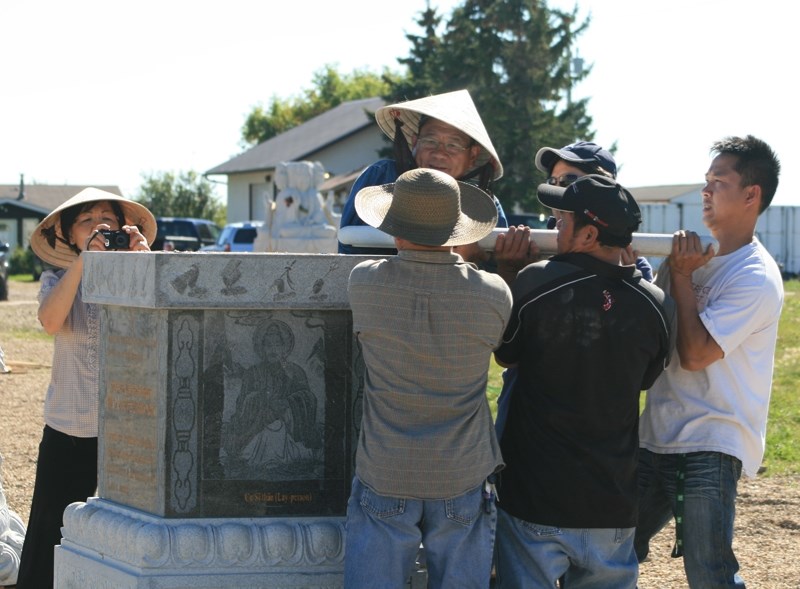 The smallest hand carved statue required six men to lift, but some of the statues that will be featured at the Westlock Meditation Centre weigh up to 30 tonnes. The project