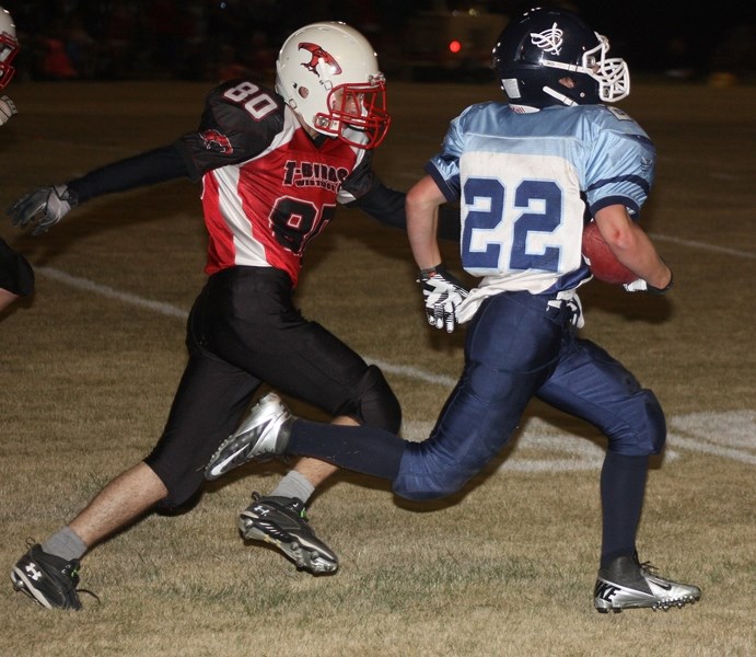 Westlock Thunderbirds’ Jake Biggeman gets ready to tackle a Vegreville Vortex receiver during the third quarter of Friday night’s 62-0 T-Bird home win. The victory improves