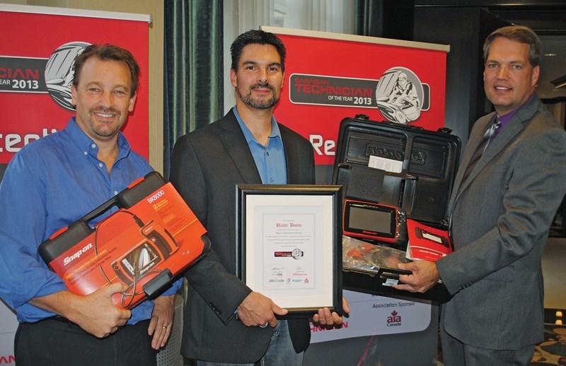 Blaine Boutin (centre) has been named the 2013 Canadian Technician of the Year. Boutin received the award at a gala ceremony in Mississauga, Ont. on Oct. 5. Pictured with