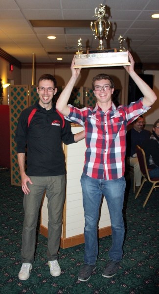 Coach Jon Kramer presented the leadership award to Zach Kiselyk at the T-Birds wind-up banquet on Dec. 5.