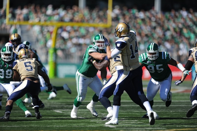 Defensive tackle Keith Shologan hustles during the Roughriders&#8217; pre-season home game against Edmonton on July 8. The Riders went on to win the Grey Cup last month; on