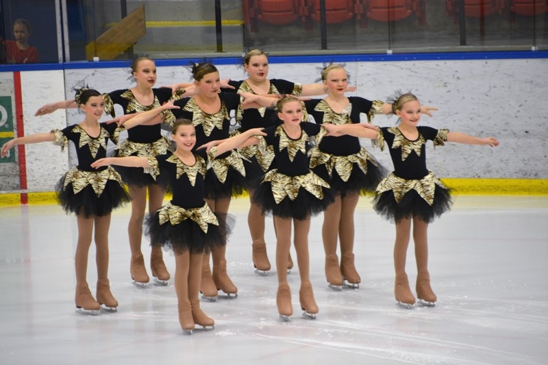 The Westlock Spirit synchronized skating team brought home a silver medal from the Rose Bowl competition held in Calgary Jan. 12. Front row, L-R, Brianna Krahn, Alysha