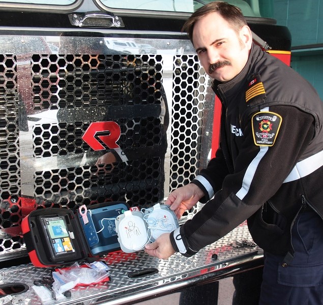 Stuart Koflick, Westlock Director Emergency Services, shows one of the many AEDs located in town facilities. Two weeks ago, an AED at the Westlock Rotary Spirit Centre helped 