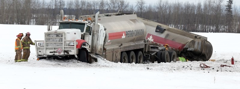 A Petro-Canada super B went off the road last Wednesday, coming to rest in a field east of Highway 44, just south of Township Road 630. The crash ruptured the second trailer, 