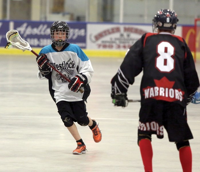 Ryan Conquergood makes his way up the floor during the Westlock bantam Rock’s May 14 game against the Edmonton Warriors. The Rock lost 9-3, dropping their record to 0-5-1 on