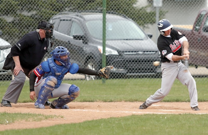 Westlock’s Jay Robinson swings through a pitch from the Edmonton Expos during the Grey Lions’ 2-1 win May 14 at Keller Field. The win lifted the home side to 2-0 on the year.