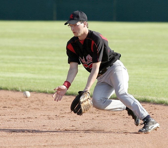Westlock Red Lions second baseman Sheldon Weber prepares to field a grounder in his team’s 8-4 loss to the Cold Lake Cardinals on May 31. The loss meant Westlock relinquished 