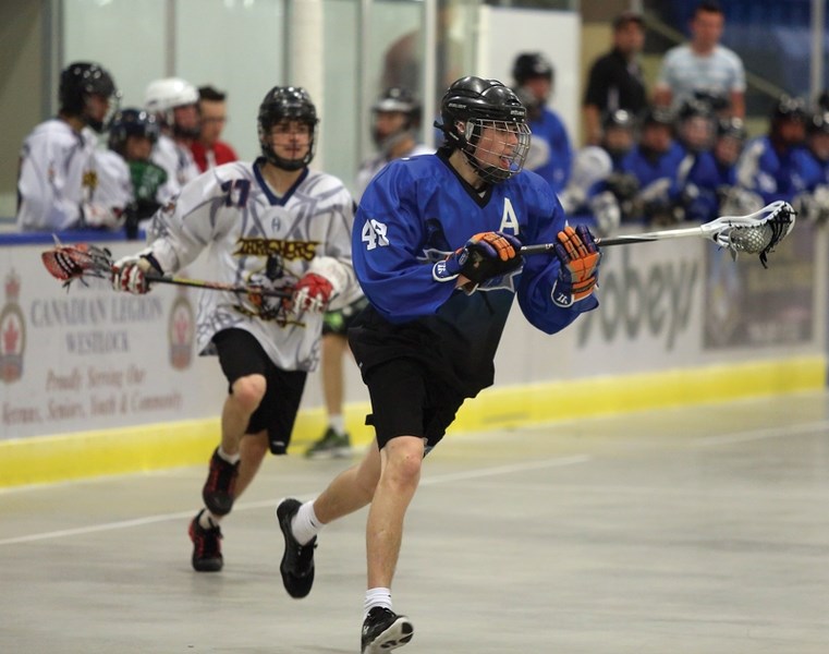 Westlock junior Rock player Jordan Boulerice works is way up the floor on June 15 against the Grande Prairie Thrashers. The Rock won 15-6, running their record to 10-0 on the 