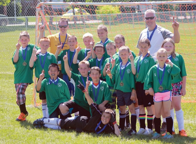 Westlock’s U12 Soccer Team won gold after beating Ardrossan at the Tri-County Cup tournament June 21-22 in Redwater. Left to right: Carter Byvank, Blake Olsen, Winson Hong