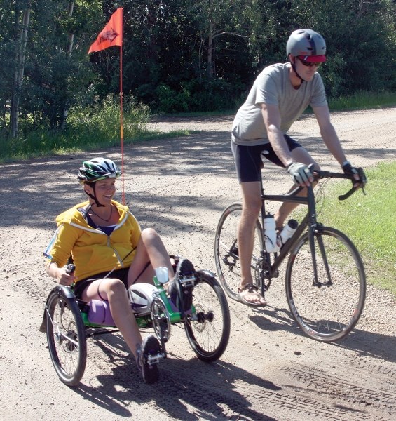 Trina Preugschas and Peter Ogden pull into a rest stop last Friday morning on the final leg of the 2014 cycleforward tour, which ended in Barrhead. The fundraising tour