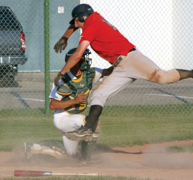 Westlock Red Lions Ryan Teske gets tagged out at home plate during a 4-1 Tuesday-night win over the Sherwood Park Athletics.
