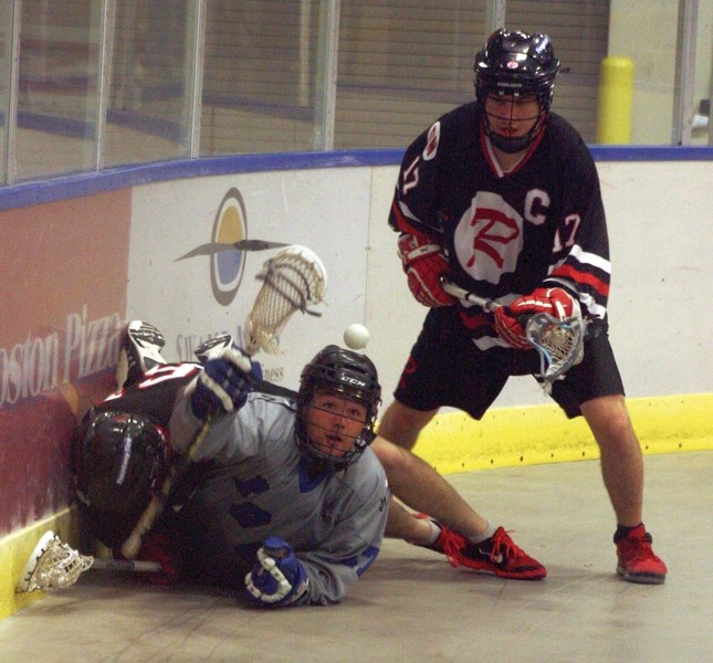 Westlock Rock’s Cole Walker tries to recover the ball after being knocked down by Fort Saskatchewan Rebels during Game 2 of the League Championship Series last Saturday