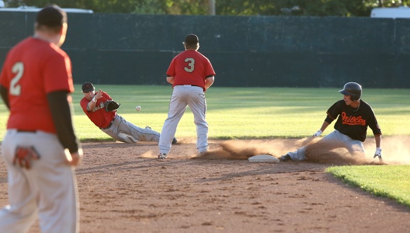 Red Lions’ second baseman Jordan Brand fields the ball and tries to get it to shortstop Aaron Watamaniuk for the force-out at second late in the team’s 4-2 loss to the
