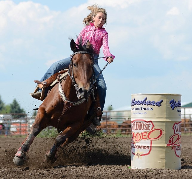 Clyde’s Quincy Squair rounds a barrel during the junior barrels competition at the Blue Heron Fair rodeo in Barrhead, which ran Aug. 9-10. The Westlock &#038; District Ag