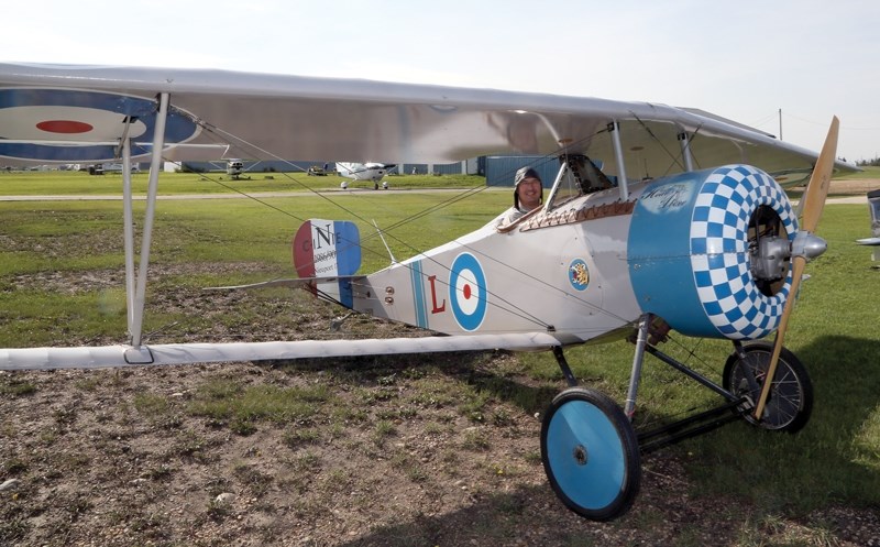 Dan Blackburn sits in his replica First World War French biplane at the Aug. 10 Westlock Flying Club fly-in breakfast. His was one of two biplanes to make the trip from