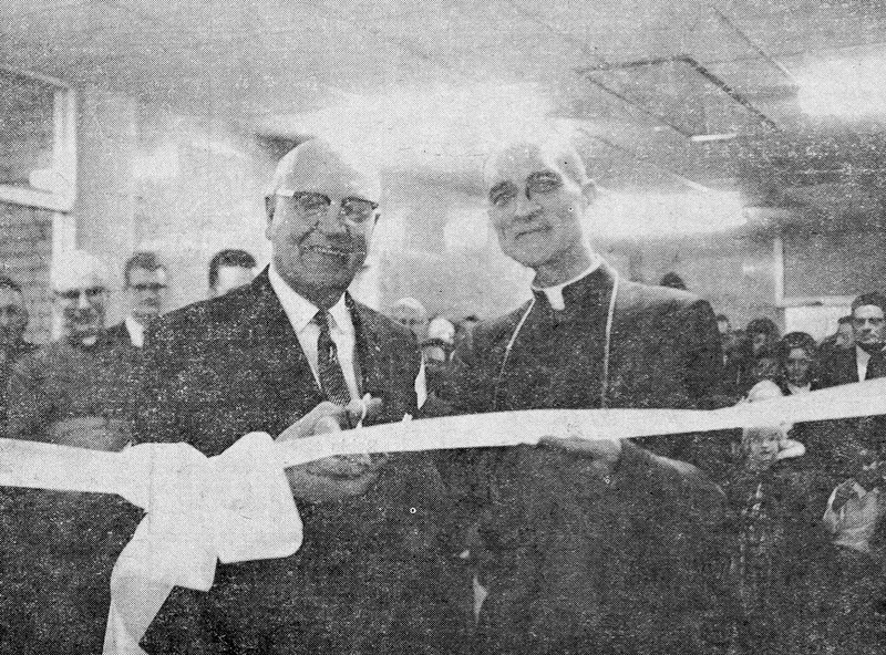 The official ribbon cutting for the opening of St. Mary School featured in the Dec. 9, 1964 Westlock News. Pictured are (L-R) R.D. Jorgenson and Bishop Philip Lussier cutting 
