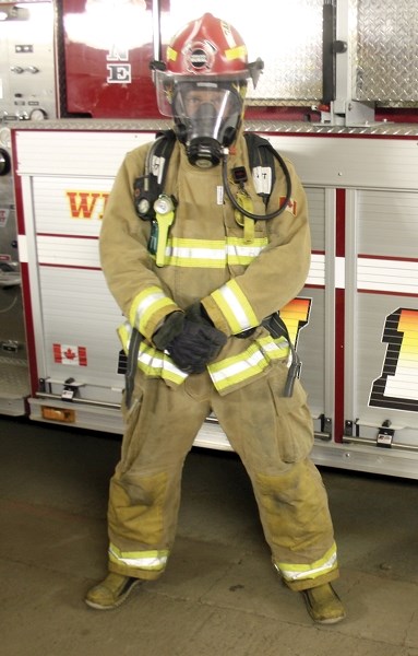 Westlock Rural firefighter Mike Walmsley will do the Terry Fox Run this year in full gear, including oxygen tanks.