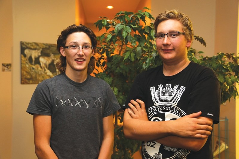 The actions of both Tristen Fauque (left) and Michiel Hoogewoonink helped the female passenger of the Aug. 31 collision in Fawcett survive her injuries.