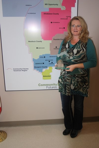 Kelly Harris-Martin, general manager of Tawatinaw Valley Community Futures, was honoured with the Swan-Knight award which recognizes leadership and efforts to foster