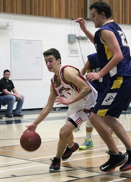 T-Bird Jeff Fagnan drives to the hoop during the club’s opening tournament of the year in Athabasca Dec. 13-14.