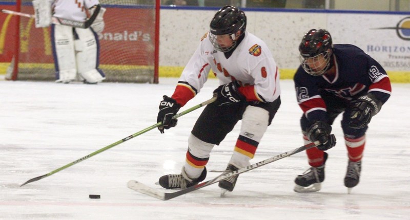 Westlock Warrior Robert Bokenfohr crosses the centre line during an 8-2 loss to Wetaskiwin on Dec. 21. The young team has struggled so far this season, but coach Doug