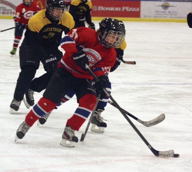Parker Blades weaves he way through the Mayerthorpe defence on his way to scoring a goal during a Westlock Fun Hockey tournament at the Westlock Rotary Spirit Centre last