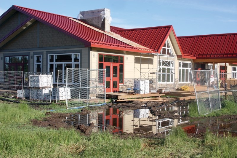 The new Tawatinaw Valley ski chalet may need to be physically lifted to avoid flooding.