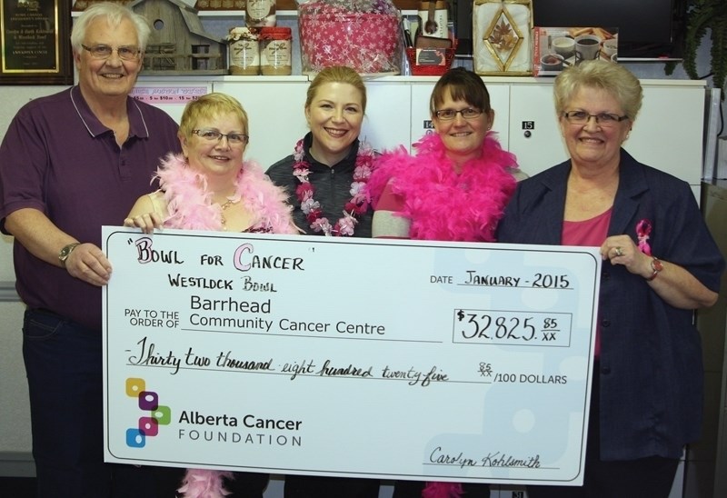 The organizers of the fourth annual Bowl for Cancer present a cheque for $32,825 to the Barrhead Community Cancer Centre on Sunday. From left are Garth Kohlsmith, Barrhead